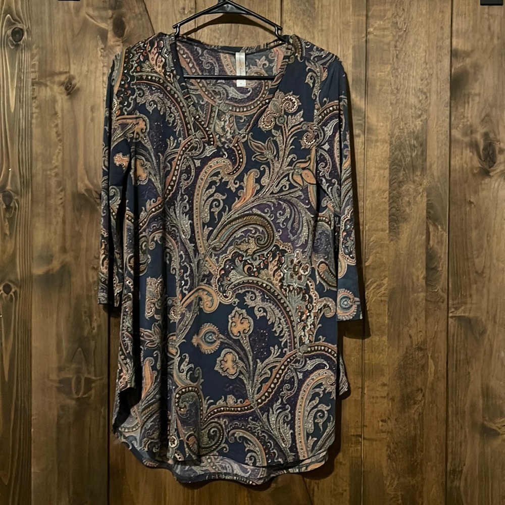Size medium shirt.